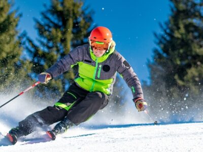 Skier carving a turn on a ski slope in Montenegro