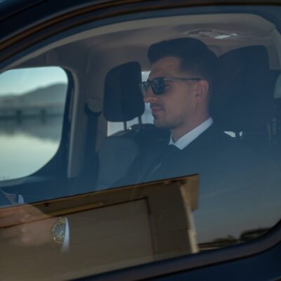 Professional driver inside Toyota Proace Verso van operated by LAZEX TRANSFER